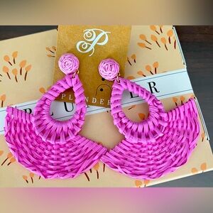 Pink plunder earrings.